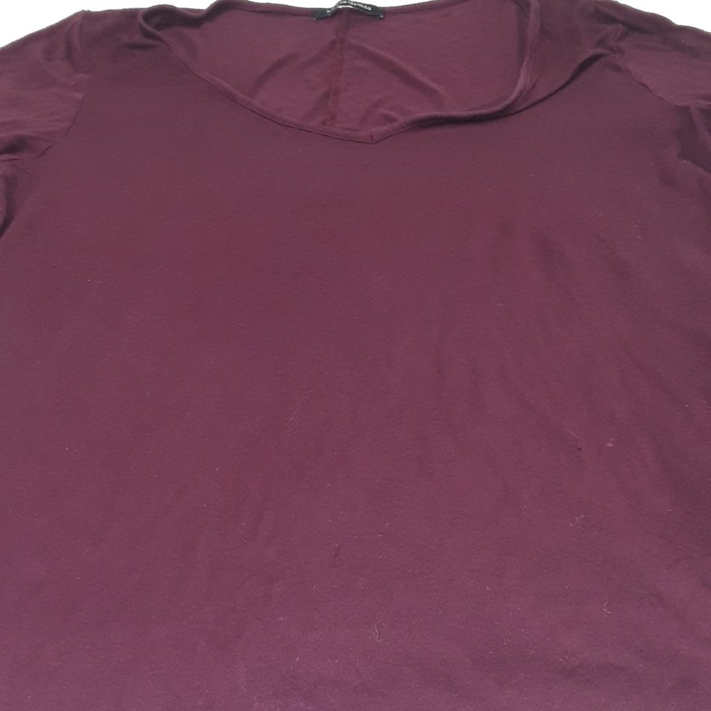 Hippie Chic burgundy top with cutouts at end of sleeves